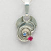 Jim Kelly Tanzanite and Lab Ruby Swirl Silver Pendant